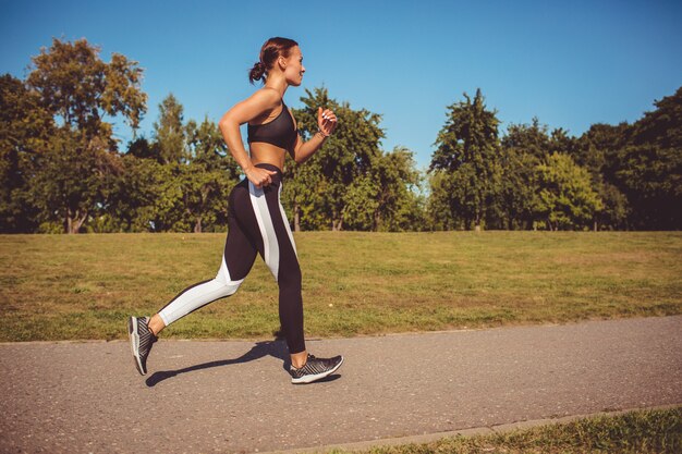 Girl doing exercise in the park