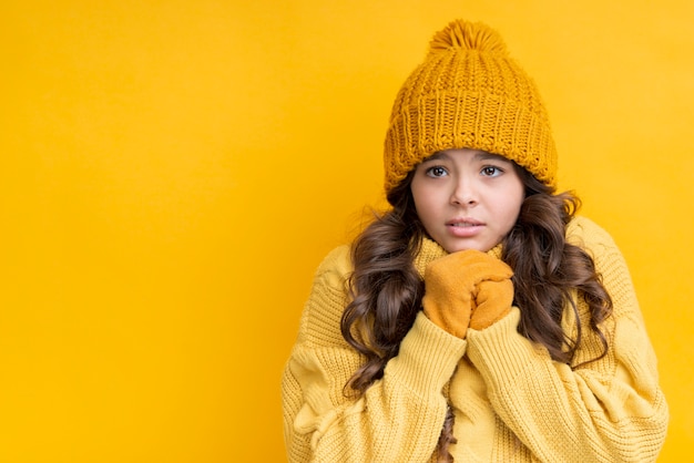 Free Photo girl dressed in yellow on a yellow background