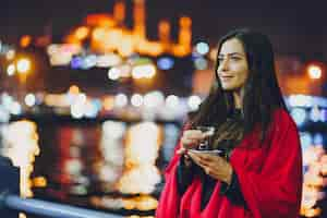 Free photo girl drinking tea in istanbul