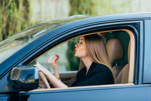 Girl drive a car with different gesture and emotions