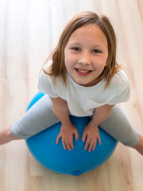 Girl exercise on ball