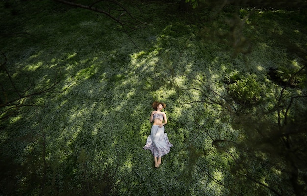 Girl in garden shooted from above