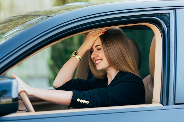 Girl gesture about mistake on road in drive car