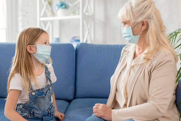 Girl and grandma with mask