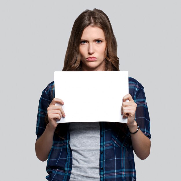 Girl holding white billboard