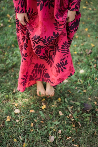 Free photo girl in a linen dress. with a wreath of flowers on her head.