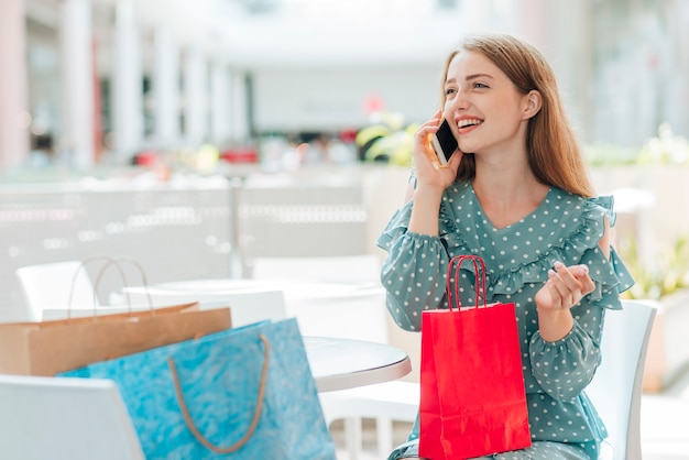 Girl looking away and talking on the phone