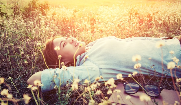 Girl lying in a field