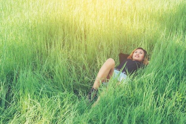 Girl lying on the grass