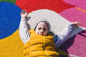 Free photo girl lying on rubber ground