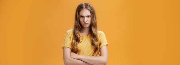 Free photo girl mad like devil portrait of angry bothered and offended hateful young woman looking from under f