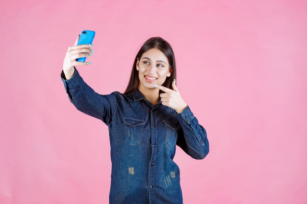 Girl making a video call or taking selfies