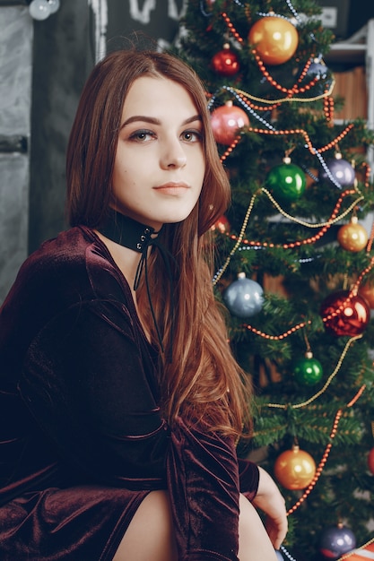 girl near christmas tree