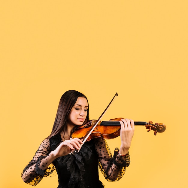 Free Photo girl playing the violin