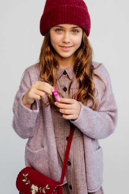 Free photo girl playing with soap bubbles