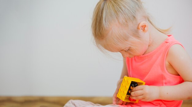 Girl playing with toy