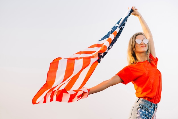 Free Photo girl posing with american flag