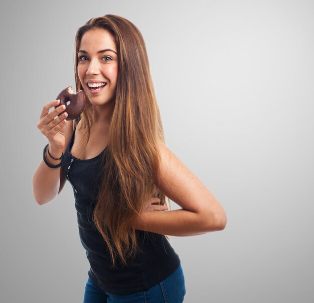 Girl posing with bagel