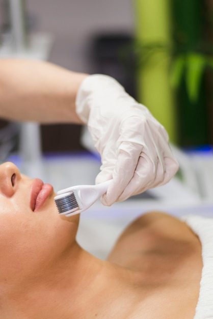 Girl receiving facial treatment in a beauty salon