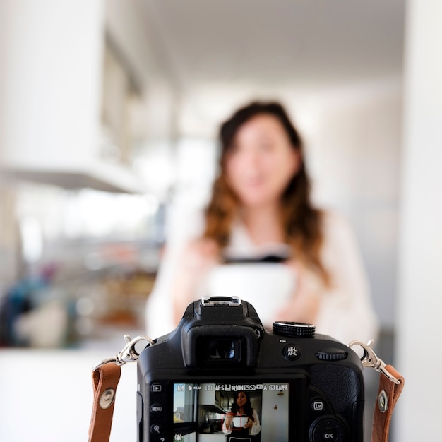 Girl recording a recipe