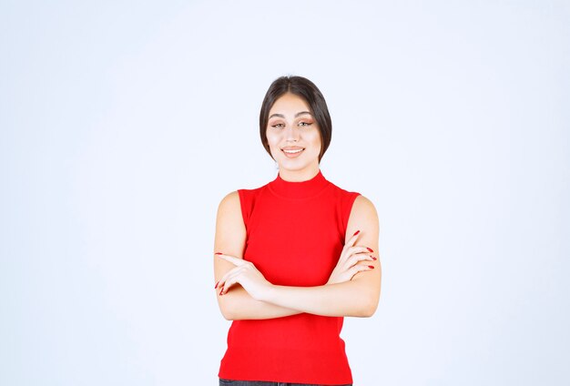 Girl in red shirt giving lovely and seductive poses.