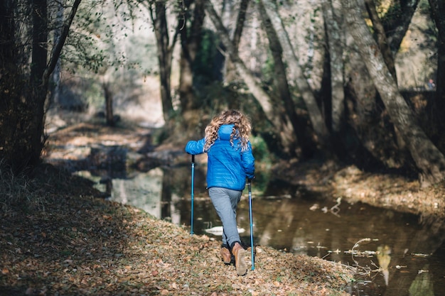 Girl running in forest