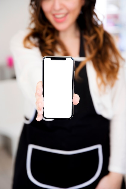 Free photo girl showing mobile phone