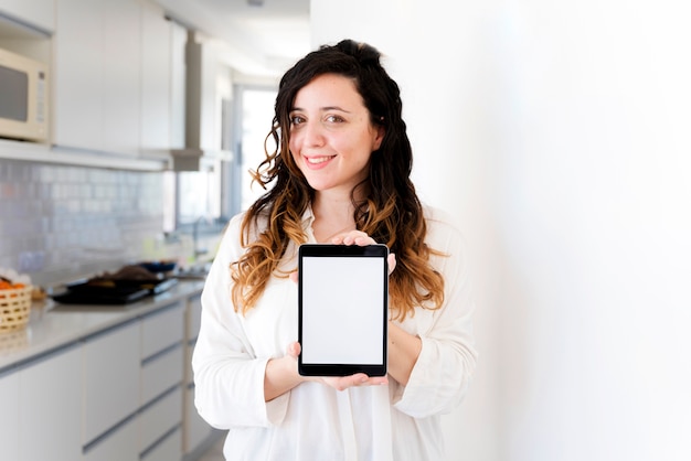 Girl showing tablet