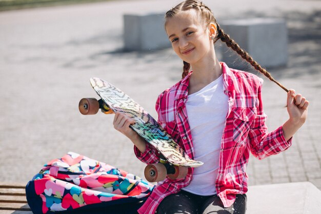 Girl skater in park