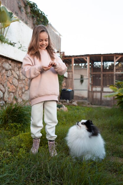 Girl spending time with her dog