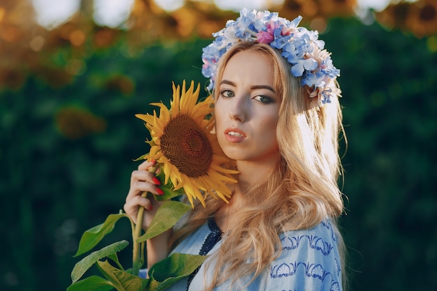 Free Photo girl and sunflowers