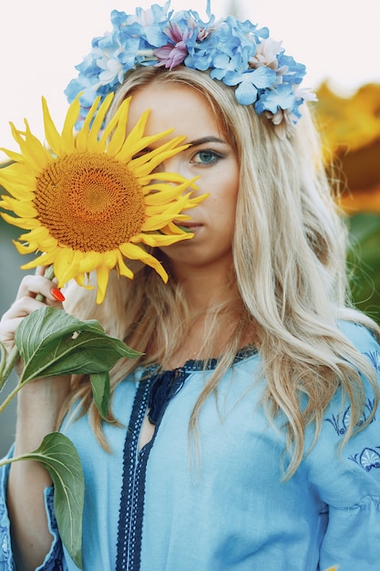 Free photo girl and sunflowers