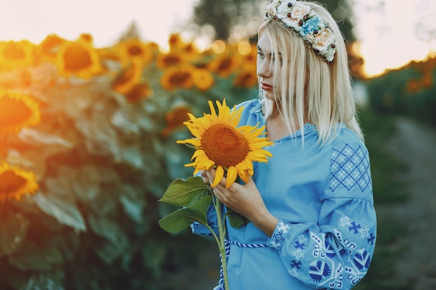 Free Photo girl and sunflowers