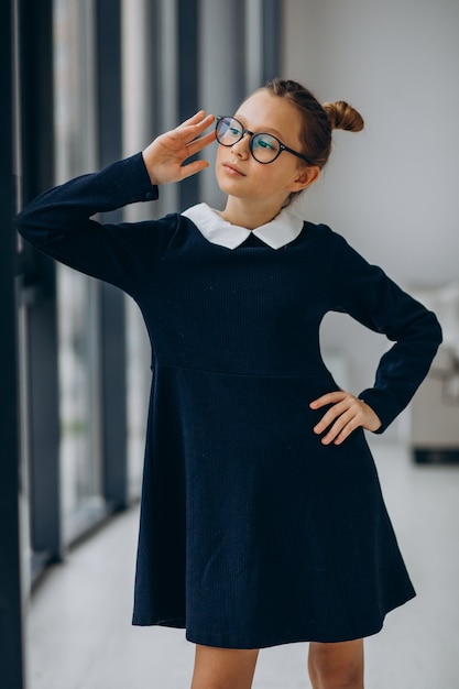 Girl teenager in school uniform