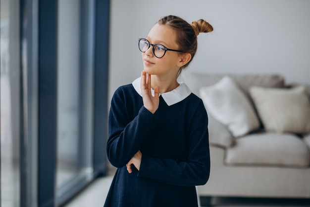 Girl teenager in school uniform