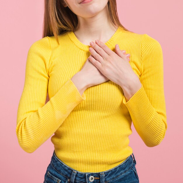 Girl touching her heart