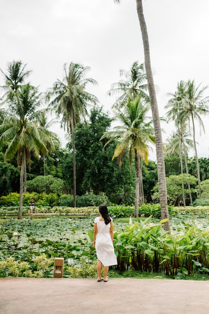 Free Photo girl in tropical field