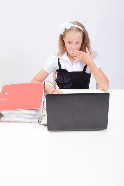 Girl using his laptop computer