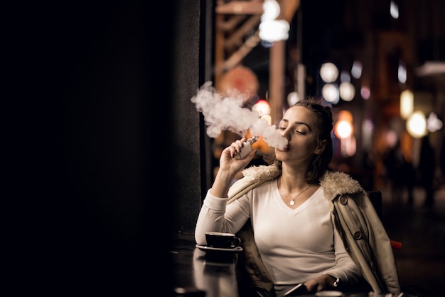 Free photo girl vaping