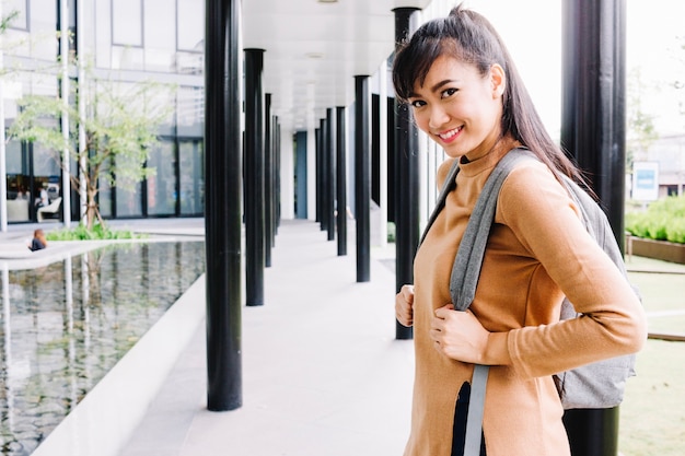 Free photo girl wearing backpack