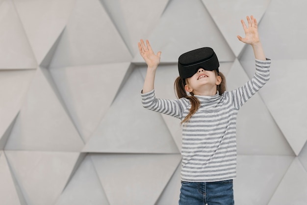 Girl wearing virtual reality headset front view