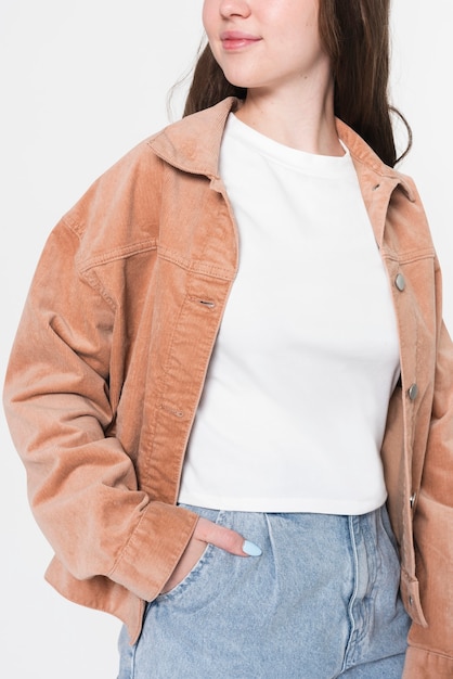 Girl in white t-shirt and brown jacket winter fashion shoot