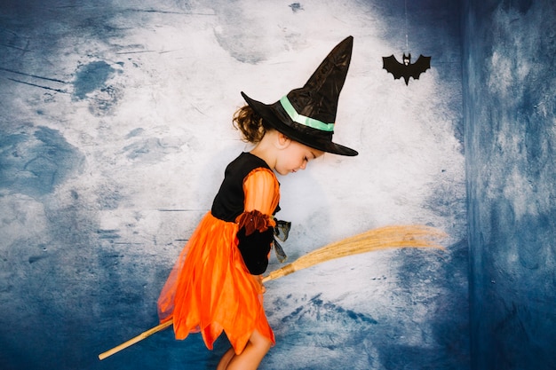 Free photo girl in witch costume