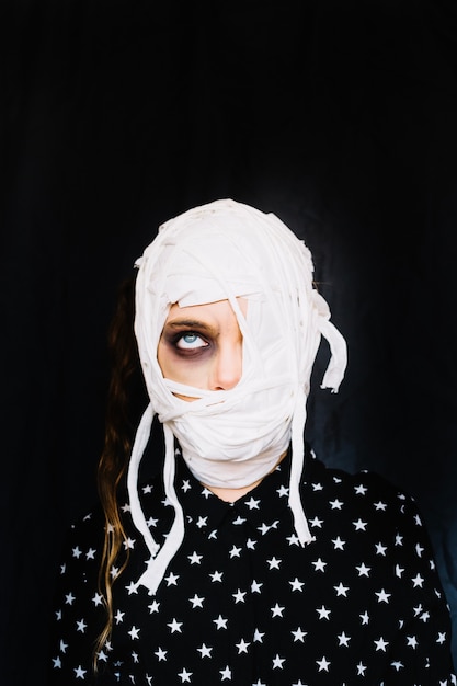 Free Photo girl with bandaged face rolling eye