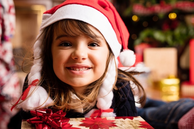 Girl with a gift and a big smile