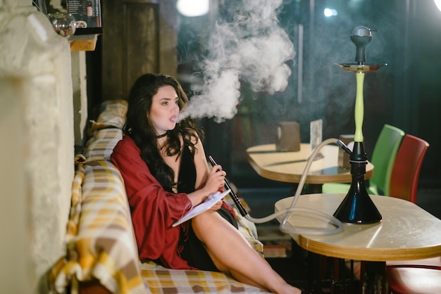 Free Photo girl with hookah