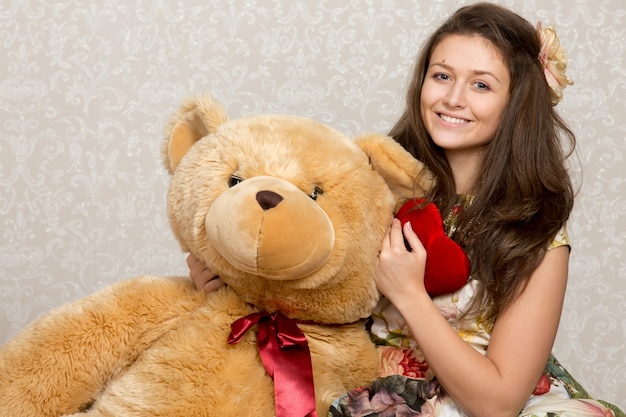 Free Photo girl with teddy bear