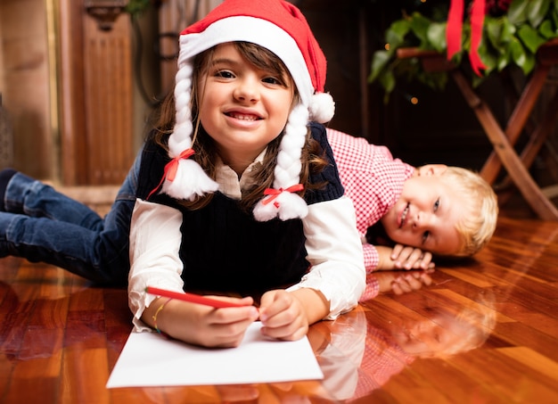 Girl writing a christmas letter