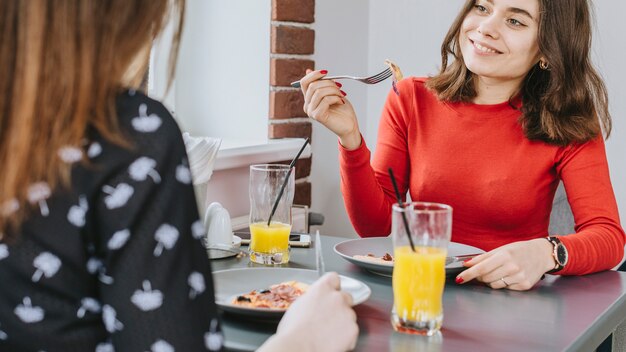 Girls eating in a restaurant