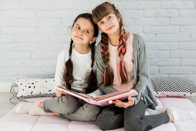 Girls reading together